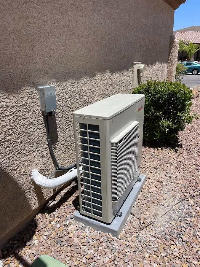 Residential air conditioning condenser unit in Chain Lake