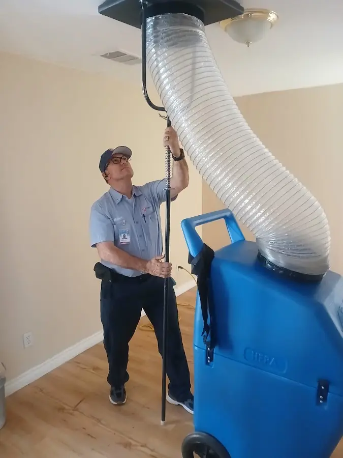 Mini Split Installation technician using HEPA equipment in Chain Lake